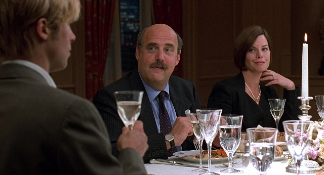 Wide shot frame from Meet Joe Black — sitting, room, table