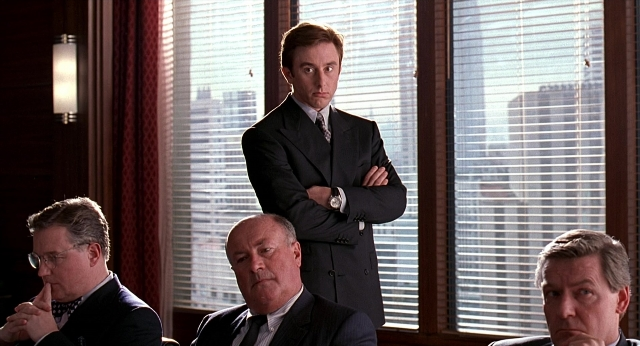 Wide shot frame from Meet Joe Black — sitting, standing, room