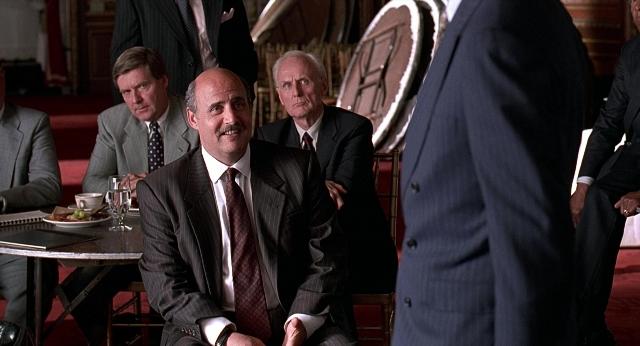 Wide shot frame from Meet Joe Black — sitting, standing, room
