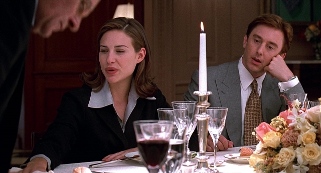 Wide shot frame from Meet Joe Black — sitting, room, table