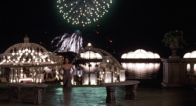 Wide shot frame from Meet Joe Black — standing, table, night