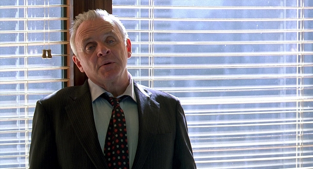 Frame from Meet Joe Black — standing, suit, tie