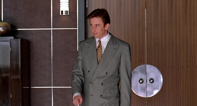 Wide shot frame from Meet Joe Black — standing, room, door