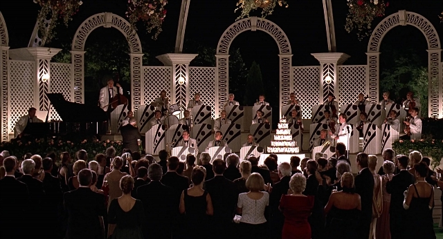 Wide shot frame from Meet Joe Black — standing, night, person