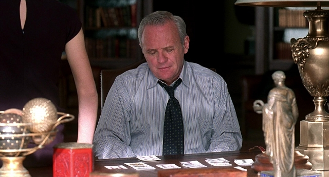 Wide shot frame from Meet Joe Black — people, sitting, action