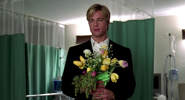 Wide shot frame from Meet Joe Black — standing, room, suit