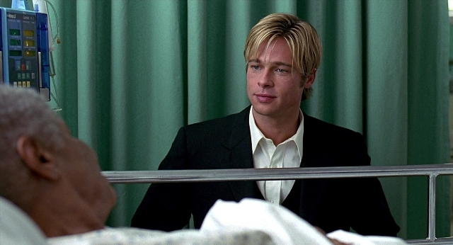 Wide shot frame from Meet Joe Black — standing, room, bed