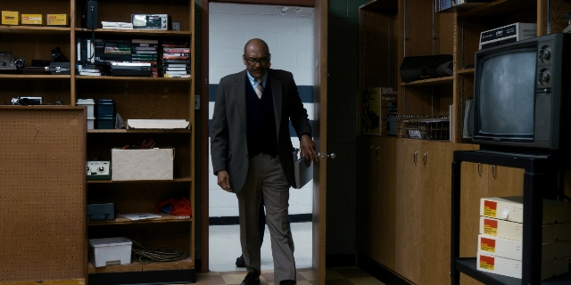 Wide shot frame from Stranger Things — walking, room, door