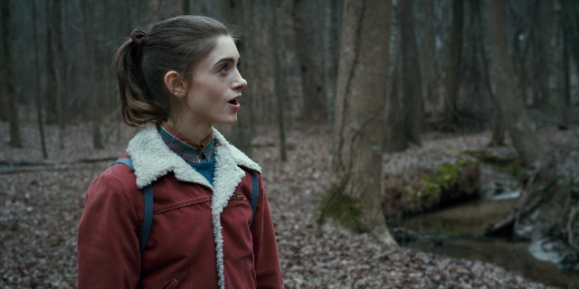 Wide shot frame from Stranger Things — standing, shirt, jacket