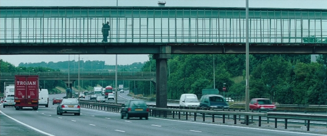 Frame from Layer Cake — car, glass, land vehicle