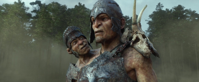 Wide shot frame from Jack the Giant Slayer — standing, hat, hand