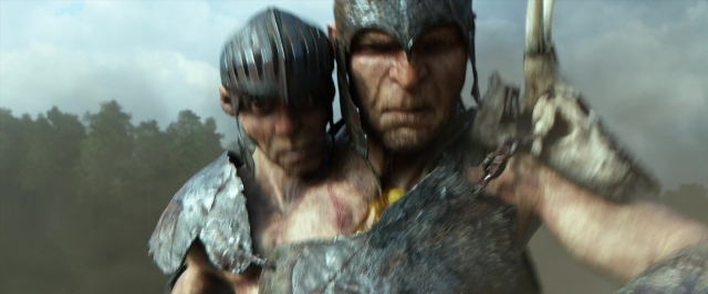 Wide shot frame from Jack the Giant Slayer — standing, hat, hand