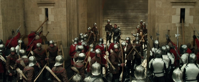 Wide shot frame from Jack the Giant Slayer — standing, room, person