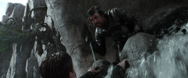 Wide shot frame from Jack the Giant Slayer — hand, beard, mustache