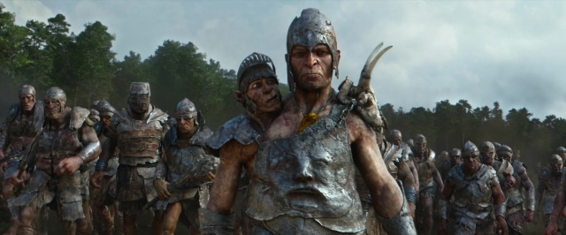 Wide shot frame from Jack the Giant Slayer — walking, hat, face