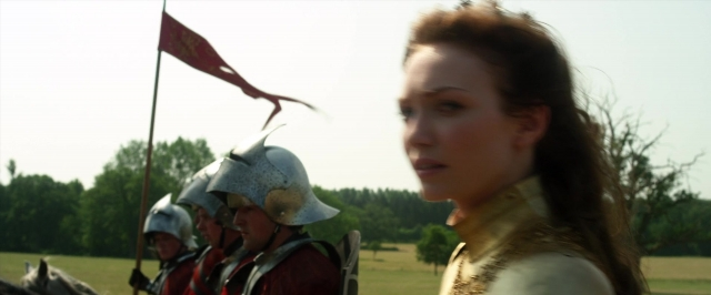 Medium shot frame from Jack the Giant Slayer — standing, flag, dress