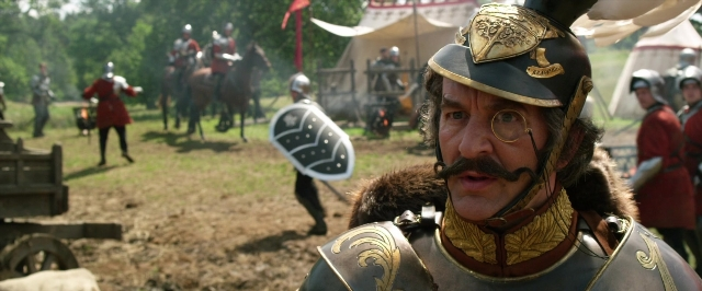 Wide shot frame from Jack the Giant Slayer — standing, hat, mustache