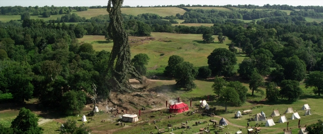 Frame from Jack the Giant Slayer — sitting, standing, tent