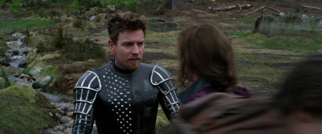 Wide shot frame from Jack the Giant Slayer — standing, suit, beard