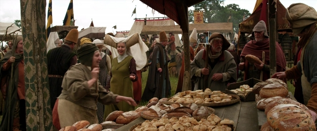 Wide shot frame from Jack the Giant Slayer — standing, table, dialogue