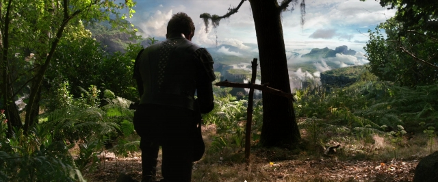 Wide shot frame from Jack the Giant Slayer — standing, forest, person