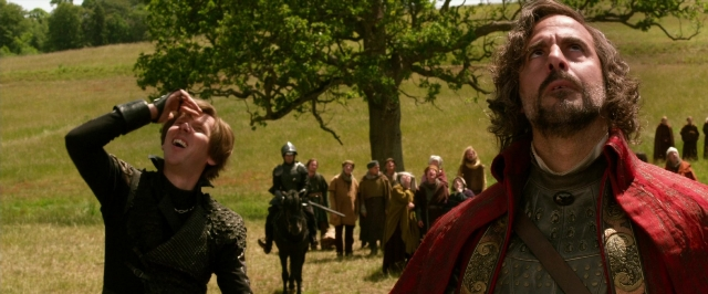 Wide shot frame from Jack the Giant Slayer — standing, hat, coat