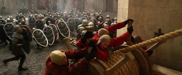 Wide shot frame from Jack the Giant Slayer — room, suit, person