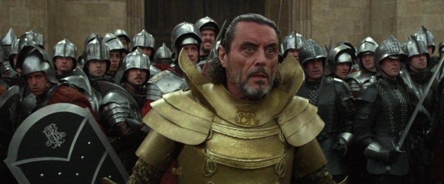 Medium shot frame from Jack the Giant Slayer — standing, hand, beard