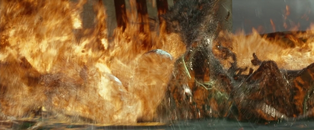 Wide shot frame from Jack the Giant Slayer — fire, water, smoke