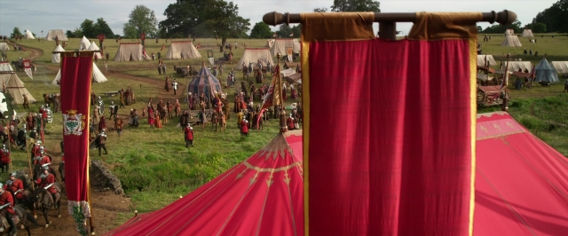 Wide shot frame from Jack the Giant Slayer — curtain, person