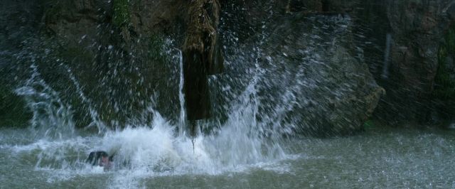 Wide shot frame from Jack the Giant Slayer — water, fountain, person