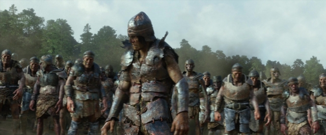 Wide shot frame from Jack the Giant Slayer — walking, street, hat