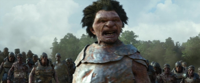 Medium shot frame from Jack the Giant Slayer — standing, hand, suit