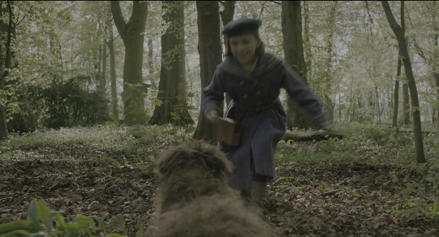 Wide shot frame from The Secret Garden — book, walking, dog