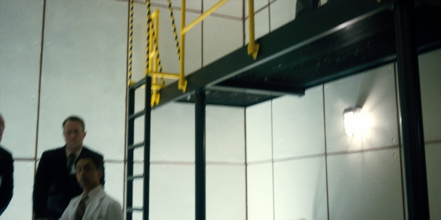 Wide shot frame from Stranger Things — people, action, standing