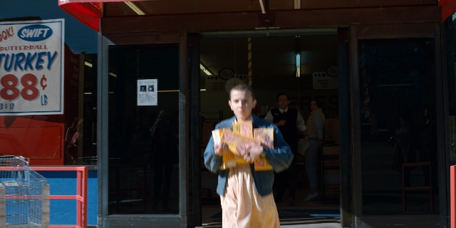 Wide shot frame from Stranger Things — people, action, show