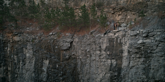 Wide shot frame from Stranger Things — standing, face, person