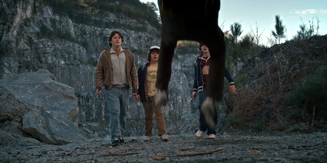 Wide shot frame from Stranger Things — walking, face, person