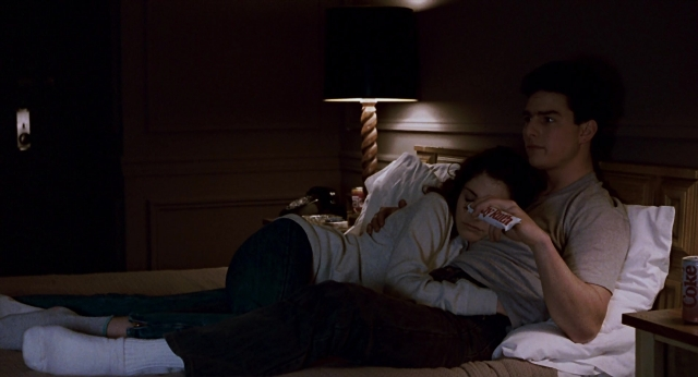Wide shot frame from The Color of Money — room, table, bed
