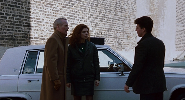 Wide shot frame from The Color of Money — standing, dialogue, car
