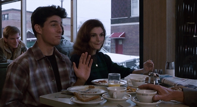 Wide shot frame from The Color of Money — sitting, table, dialogue