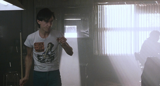 Wide shot frame from The Color of Money — people, action, standing