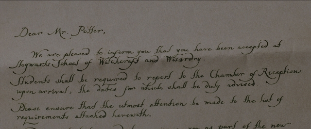 Wide shot frame from Harry Potter and the Sorcerer's Stone — hat, envelope