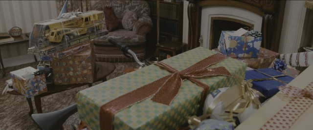 Wide shot frame from Harry Potter and the Sorcerer's Stone — room, table, furniture