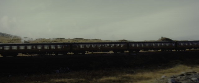 Wide shot frame from Harry Potter and the Half-Blood Prince — train, smoke