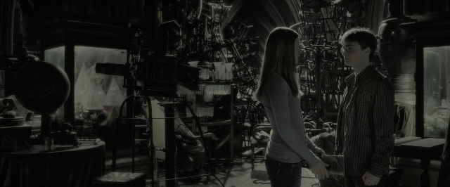 Wide shot frame from Harry Potter and the Half-Blood Prince — standing, room, dialogue