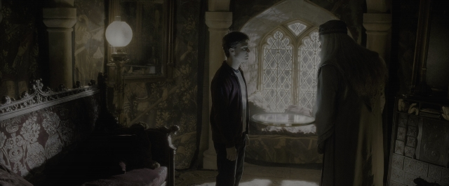 Wide shot frame from Harry Potter and the Half-Blood Prince — standing, room, bed