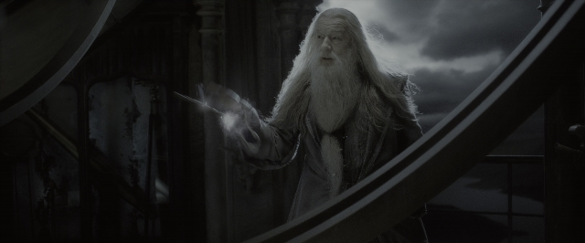 Wide shot frame from Harry Potter and the Half-Blood Prince — standing, hand, beard