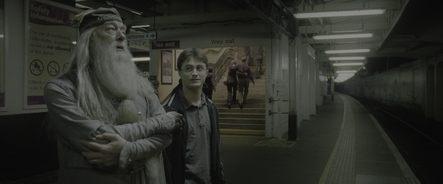 Wide shot frame from Harry Potter and the Half-Blood Prince — standing, walking, hat