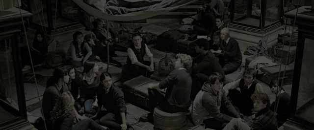 Wide shot frame from Harry Potter and the Deathly Hallows - Part 2 — sitting, standing, room